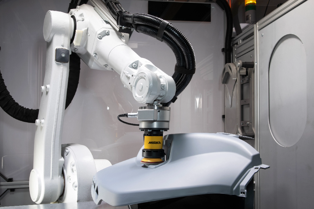 What are the main benefits of using robotics in surface treatment lines?